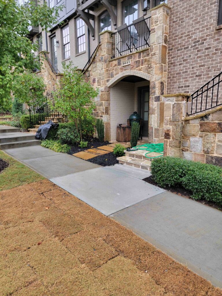 Stone entry, stoop, and sidewalk after a pressure wash